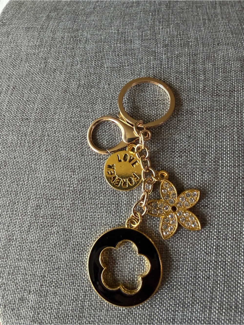 Gold-tone Keyring Bag Charm with Black Enamel Flower Charm